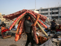 Displaced Palestinians are returning to Khan Yunis in the southern Gaza Strip to set up shelter amid the ongoing conflict between Israel and...