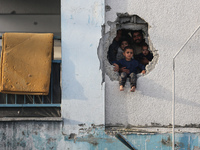 Displaced Palestinians are returning to Khan Yunis in the southern Gaza Strip to set up shelter amid the ongoing conflict between Israel and...