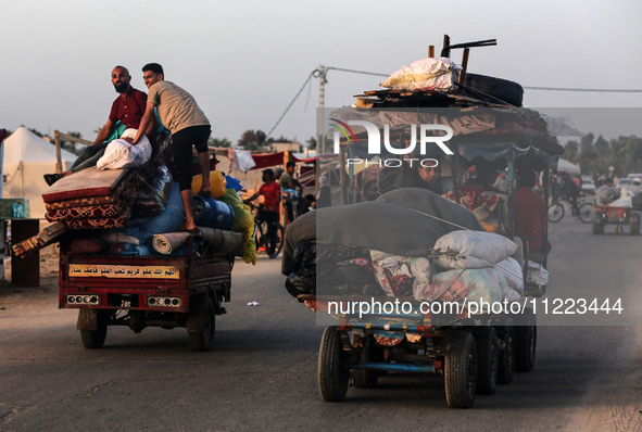 Displaced Palestinians are returning to Khan Yunis in the southern Gaza Strip to set up shelter amid the ongoing conflict between Israel and...