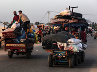 Displaced Palestinians are returning to Khan Yunis in the southern Gaza Strip to set up shelter amid the ongoing conflict between Israel and...