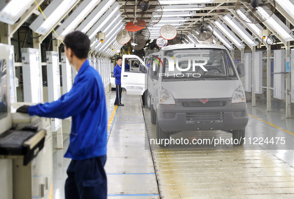 Vehicles are rolling off the production line at the Qingdao branch of SAIC-GM-Wuling Automobile Co., Ltd. in Qingdao, China, on May 9, 2024....