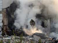 Rescuers are working at a house in Kharkiv, Ukraine, on May 10, 2024, after a Russian missile attack. During the night of May 10, Russian fo...