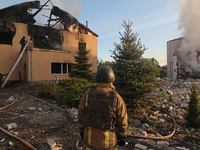 Rescuers are working at a house in Kharkiv, Ukraine, on May 10, 2024, after a Russian missile attack. During the night of May 10, Russian fo...