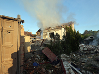 Smoke is rising over a house after a Russian missile attack in Kharkiv, northeastern Ukraine, on May 10, 2024. On the night of May 10, Russi...