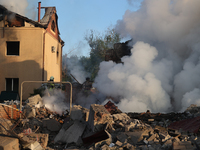 Rescuers are working at a house in Kharkiv, Ukraine, on May 10, 2024, after a Russian missile attack. During the night of May 10, Russian fo...