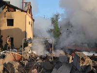 Rescuers are working at a house in Kharkiv, Ukraine, on May 10, 2024, after a Russian missile attack. During the night of May 10, Russian fo...