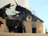 Rescuers are working at a house in Kharkiv, Ukraine, on May 10, 2024, after a Russian missile attack. During the night of May 10, Russian fo...