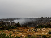 Smoke is rising as the fire continues to burn in Limassol, Cyprus, on May 10, 2024. The wildfire, which broke out yesterday, is burning most...