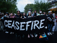 Pro-Palestinian students rally outside the office of George Washington University President Ellen Granberg, Washjngton, DC, May 9, 2024.  Po...