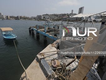 A broken dock is being seen at Tamarindos Beach in Acapulco, Mexico, on April 17, 2024, six months after Hurricane Otis hit Acapulco. The hu...