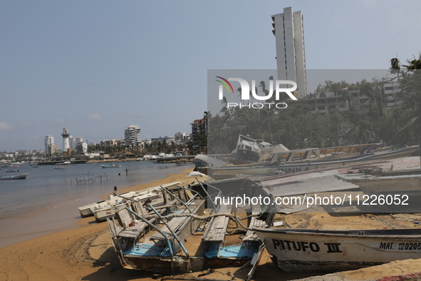 Boats are lying destroyed and abandoned on the shore of Tamarindos Beach in Acapulco, Guerrero, six months after Hurricane Otis struck, impa...