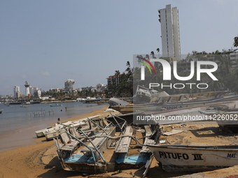 Boats are lying destroyed and abandoned on the shore of Tamarindos Beach in Acapulco, Guerrero, six months after Hurricane Otis struck, impa...