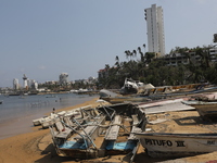 Boats are lying destroyed and abandoned on the shore of Tamarindos Beach in Acapulco, Guerrero, six months after Hurricane Otis struck, impa...