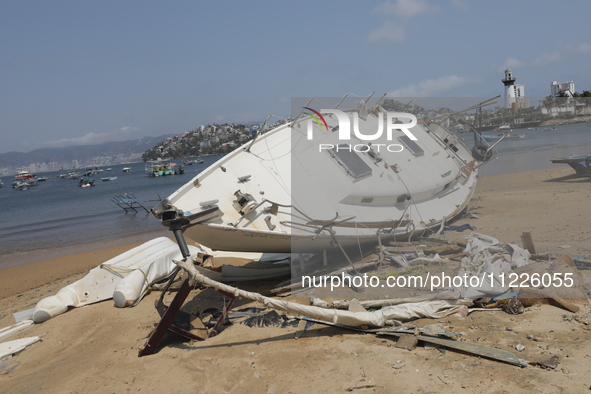 Boats are lying destroyed and abandoned on the shore of Tamarindos Beach in Acapulco, Guerrero, six months after Hurricane Otis struck, impa...