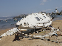 Boats are lying destroyed and abandoned on the shore of Tamarindos Beach in Acapulco, Guerrero, six months after Hurricane Otis struck, impa...