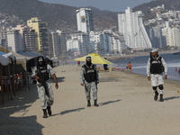 Members of the National Guard are monitoring the hotel zone of Tamarindos Beach in Acapulco, Guerrero, on April 17, 2024, six months after H...