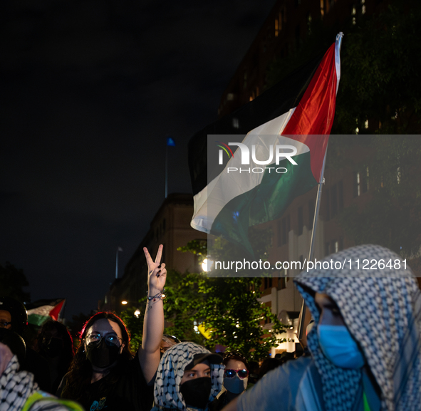 Pro-Palestinian students and their supporters rally outside the office of George Washington University president Ellen Granberg, Washington,...