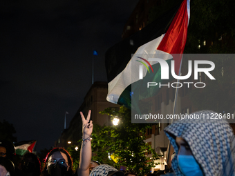 Pro-Palestinian students and their supporters rally outside the office of George Washington University president Ellen Granberg, Washington,...