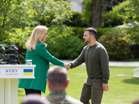 Presidents Volodymyr Zelenskyy of Ukraine and Zuzana Caputova of Slovakia are shaking hands during a joint briefing in Kyiv, Ukraine, on May...