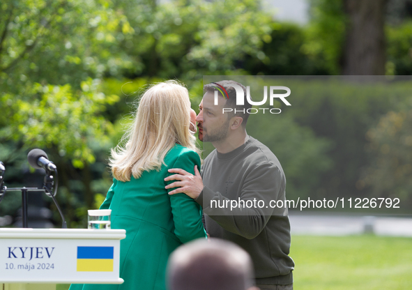 Presidents Volodymyr Zelenskyy of Ukraine and Zuzana Caputova of Slovakia are greeting each other during a joint briefing in Kyiv, Ukraine,...