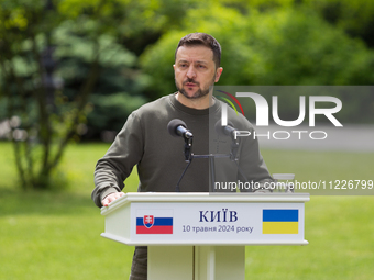 President Volodymyr Zelenskyy of Ukraine is speaking during a joint briefing with President Zuzana Caputova of Slovakia in Kyiv, Ukraine, on...