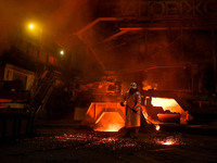 A worker is performing his duties in a blast furnace shop at Zaporizhstal Iron and Steel Works in Zaporizhzhia, Ukraine, on May 3, 2024. (