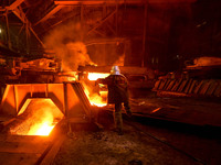 A worker is performing his duties in a blast furnace shop at Zaporizhstal Iron and Steel Works in Zaporizhzhia, Ukraine, on May 3, 2024. (