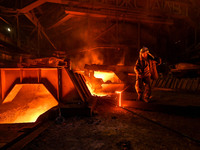 A worker is performing his duties in a blast furnace shop at Zaporizhstal Iron and Steel Works in Zaporizhzhia, Ukraine, on May 3, 2024. (