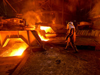 A worker is performing his duties in a blast furnace shop at Zaporizhstal Iron and Steel Works in Zaporizhzhia, Ukraine, on May 3, 2024. (