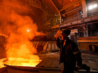 A worker is performing his duties in a blast furnace shop at Zaporizhstal Iron and Steel Works in Zaporizhzhia, Ukraine, on May 3, 2024. (