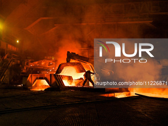 A worker is performing his duties in a blast furnace shop at Zaporizhstal Iron and Steel Works in Zaporizhzhia, Ukraine, on May 3, 2024. (