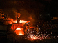 Workers are performing their duties in a blast furnace shop at Zaporizhstal Iron and Steel Works in Zaporizhzhia, southeastern Ukraine, on M...