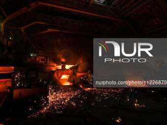 Workers are performing their duties in a blast furnace shop at Zaporizhstal Iron and Steel Works in Zaporizhzhia, southeastern Ukraine, on M...