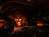 Workers are performing their duties in a blast furnace shop at Zaporizhstal Iron and Steel Works in Zaporizhzhia, southeastern Ukraine, on M...