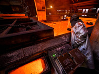 A worker is performing his duties in a blast furnace shop at Zaporizhstal Iron and Steel Works in Zaporizhzhia, Ukraine, on May 3, 2024. (