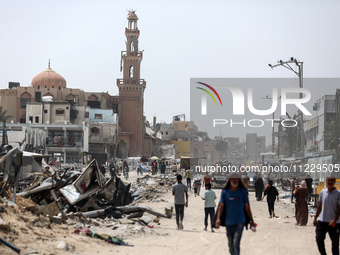 Displaced Palestinians are setting up shelter after returning to Khan Yunis in the southern Gaza Strip, amid the ongoing conflict between Is...