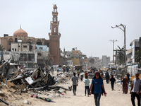 Displaced Palestinians are setting up shelter after returning to Khan Yunis in the southern Gaza Strip, amid the ongoing conflict between Is...