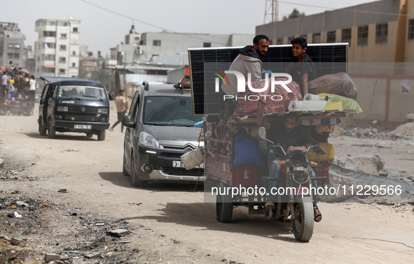 Displaced Palestinians are setting up shelter after returning to Khan Yunis in the southern Gaza Strip, amid the ongoing conflict between Is...