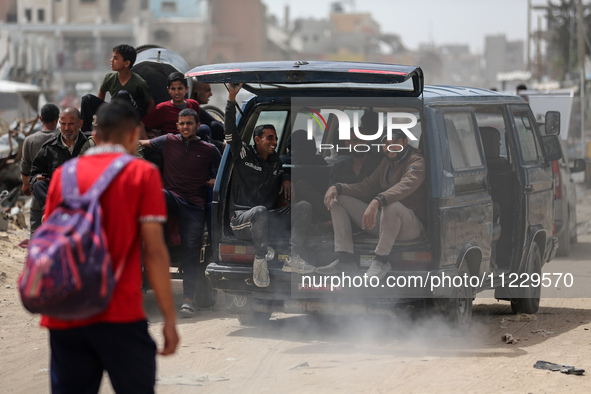 Displaced Palestinians are setting up shelter after returning to Khan Yunis in the southern Gaza Strip, amid the ongoing conflict between Is...