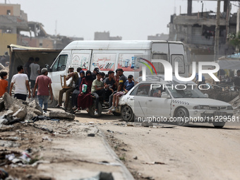 Displaced Palestinians are setting up shelter after returning to Khan Yunis in the southern Gaza Strip, amid the ongoing conflict between Is...