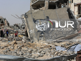 Displaced Palestinians are setting up shelter after returning to Khan Yunis in the southern Gaza Strip, amid the ongoing conflict between Is...