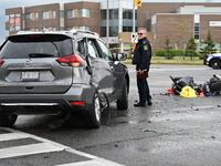 A Nissan Rogue and a motorcycle are at the crash site in Brampton, Ontario, Canada, on May 11, 2024. A motor vehicle crash involving these t...