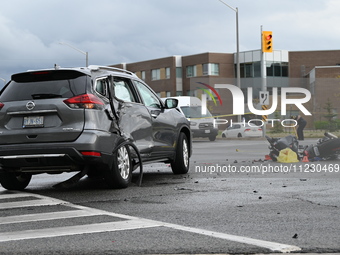 A Nissan Rogue and a motorcycle are at the crash site in Brampton, Ontario, Canada, on May 11, 2024. A motor vehicle crash involving these t...