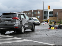 A Nissan Rogue and a motorcycle are at the crash site in Brampton, Ontario, Canada, on May 11, 2024. A motor vehicle crash involving these t...