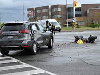 A Nissan Rogue and a motorcycle are at the crash site in Brampton, Ontario, Canada, on May 11, 2024. A motor vehicle crash involving these t...