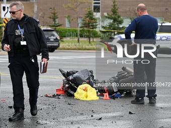 A motorcycle is at the crash site where a motor vehicle accident involving a Nissan Rogue and a motorcycle is leaving the motorcyclist in li...