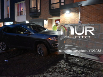 A vehicle is striking a home and possibly a gas meter in Toronto, Ontario, Canada, on May 11, 2024. Around 7:00 p.m. on Saturday evening, th...