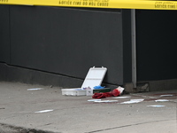 Police are responding to a slashing attack with evidence and blood visible on the ground in Toronto, Ontario, Canada, on May 12, 2024. They...