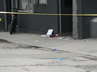 Police are responding to a slashing attack with evidence and blood visible on the ground in Toronto, Ontario, Canada, on May 12, 2024. They...