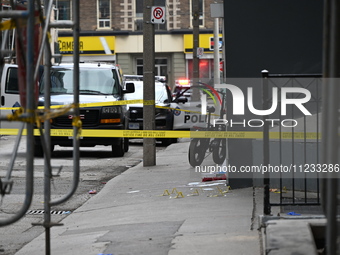 Evidence markers are at the scene of a slashing attack where evidence and blood have been discovered on the ground. Police are currently see...